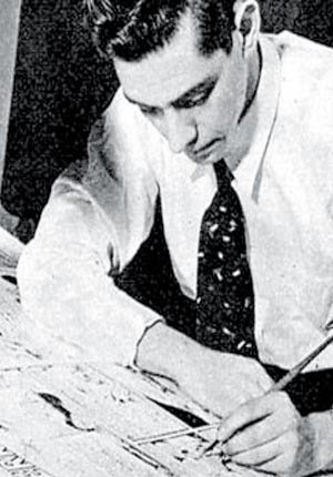 Joe Shuster at the drawing table